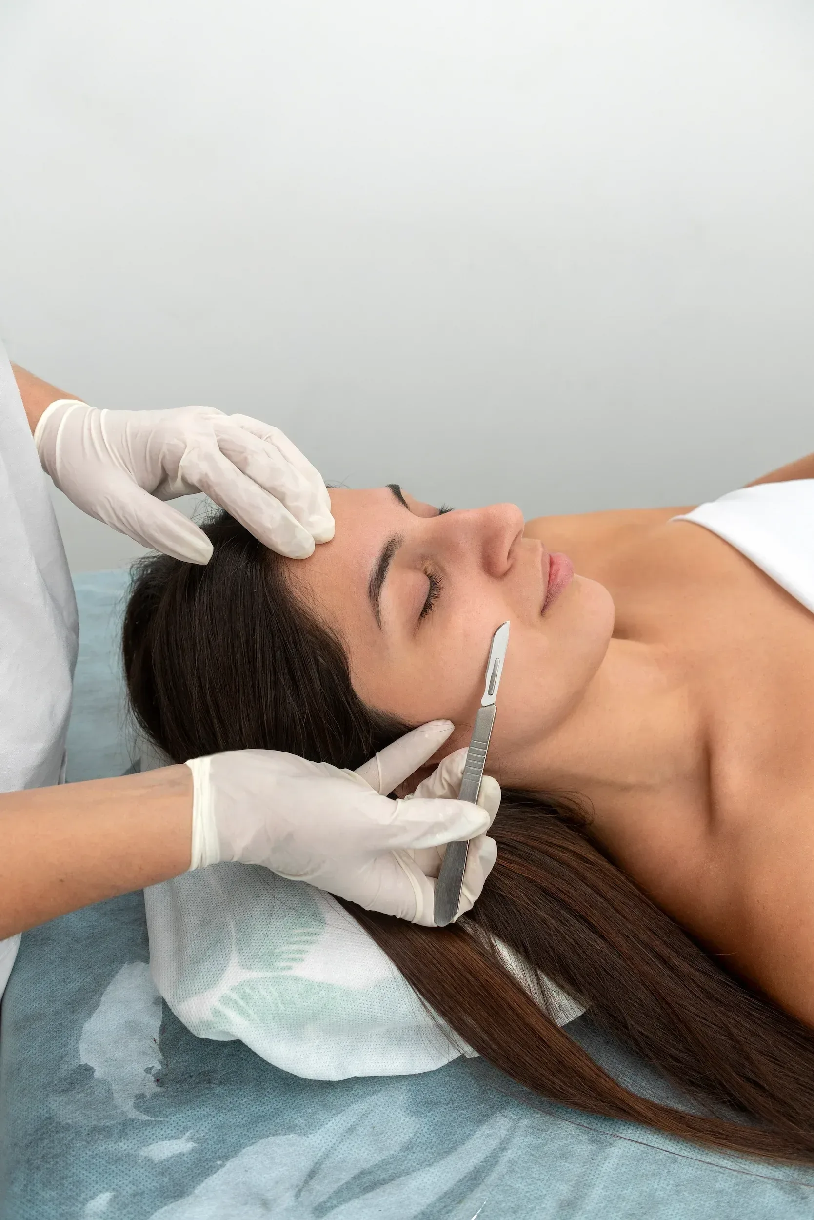 Close view of smooth, bright facial skin after a dermaplaning exfoliation treatment at Applegate Dentistry and MedSpa