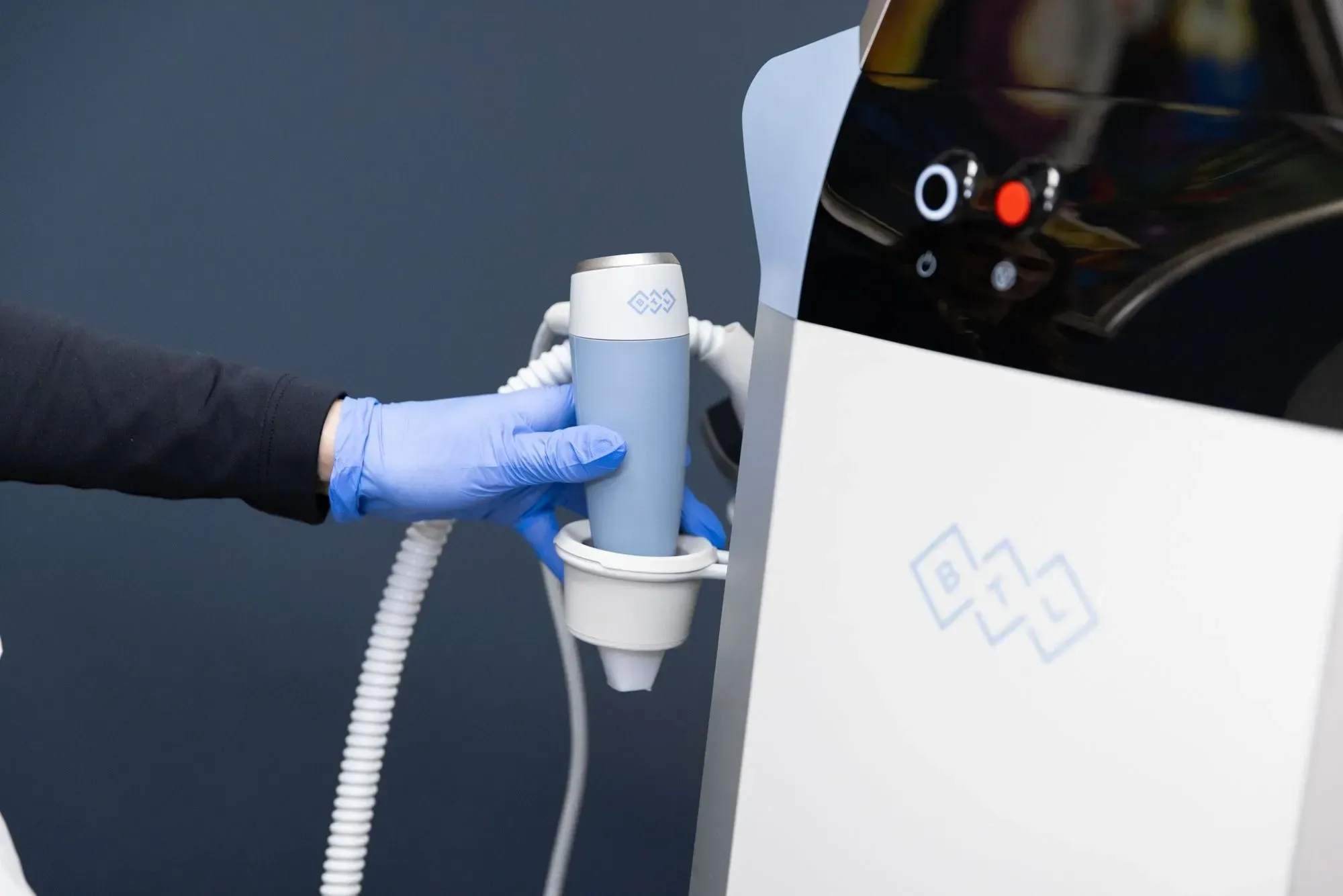 Exion RF microneedling applicator treating a patient's cheek at Applegate Dentistry & MedSpa in Covington, KY